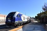 Amtrak Train # 531 arriving into Martinez Station behind Caltrans Charger # 2106 